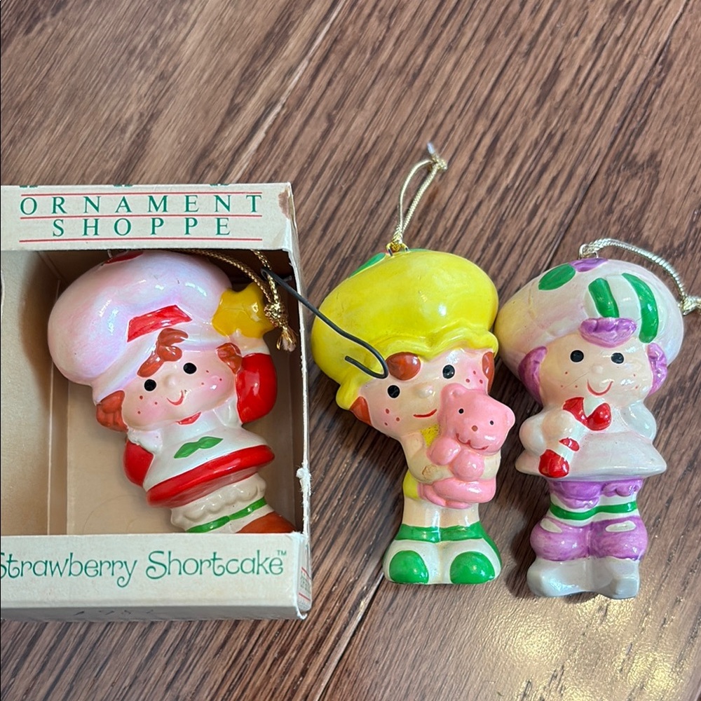 American greetings. Strawberry shortcake ornaments. Apple dumpling. Raspberry.